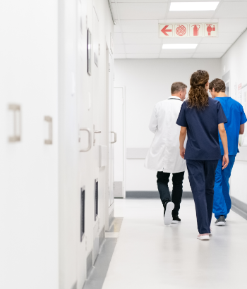 doctor and surgeon walking