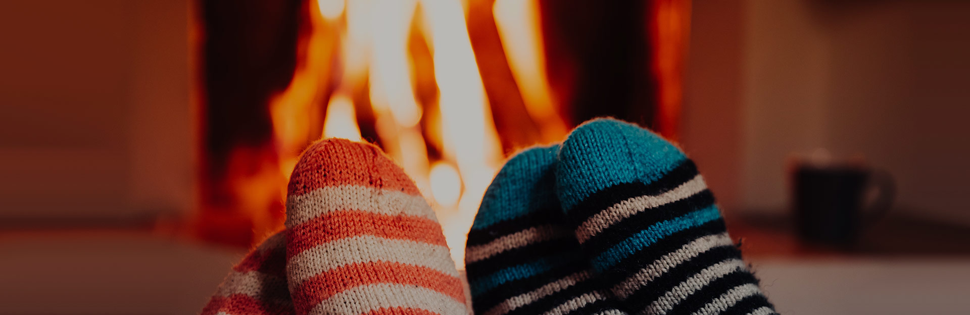Warming feet by the fire