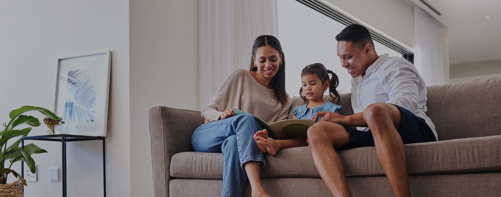 Family hanging out on a couch
