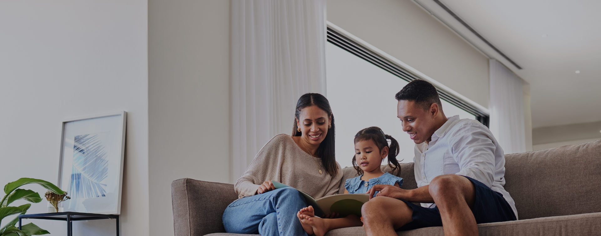 Family hanging out on a couch